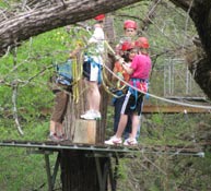 Getting ready to zip to the next tree at Cypress Valley Canopy Tours