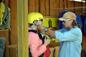 Getting fitted with rafting gear