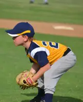 Grandson playing baseball